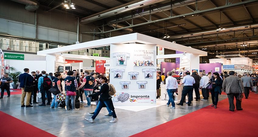 People browsing at a trade show exhibition