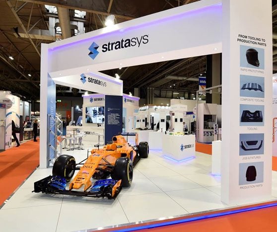 Stratasys exhibition stand featuring a race car